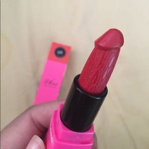 Red lipstick in shape of a penis